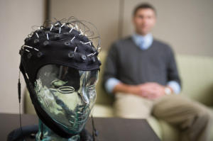 (Professor Pontifex observes EEG cap test)  Okay, maybe the experimental tools are little more complex than suggested...